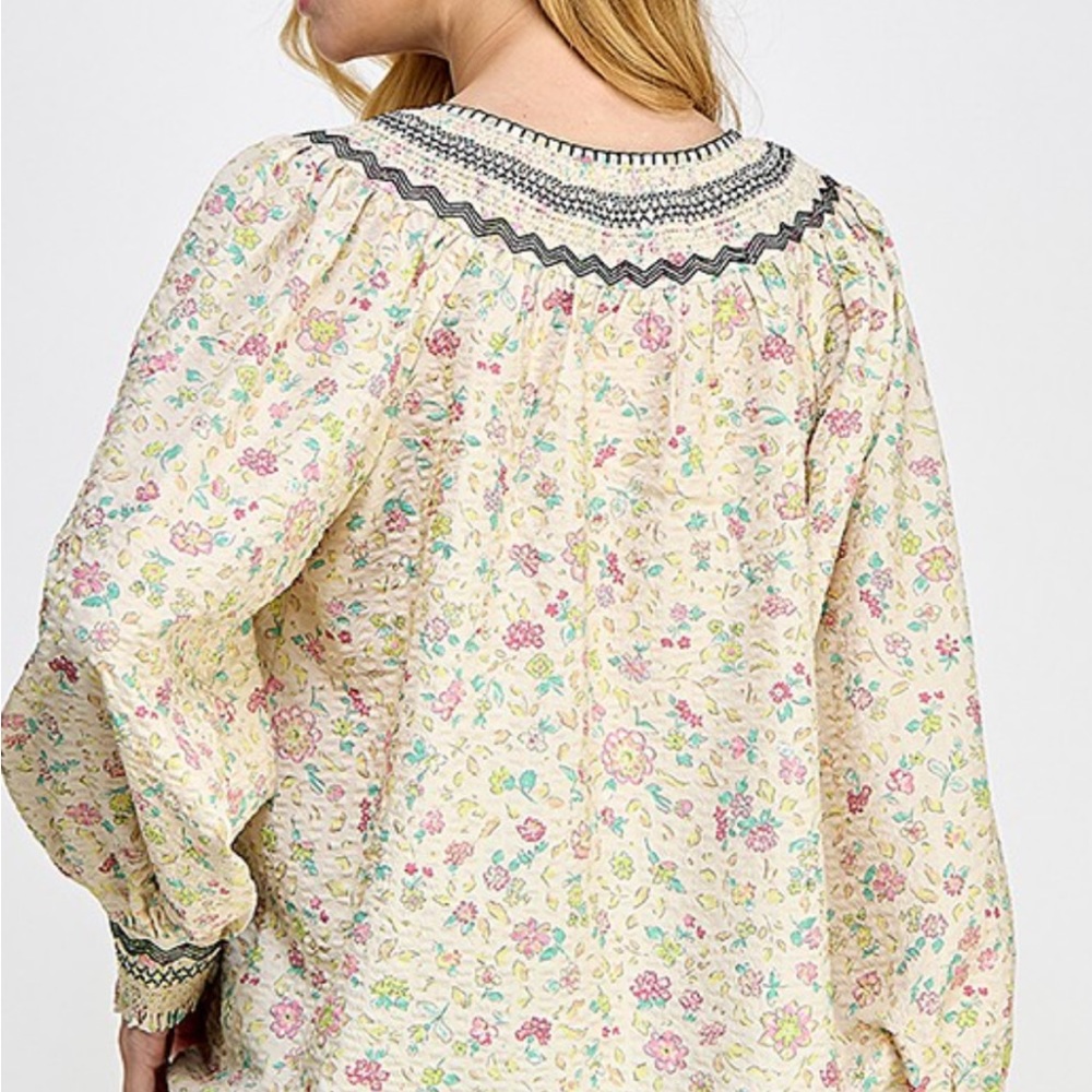 Cream with flowers blouse